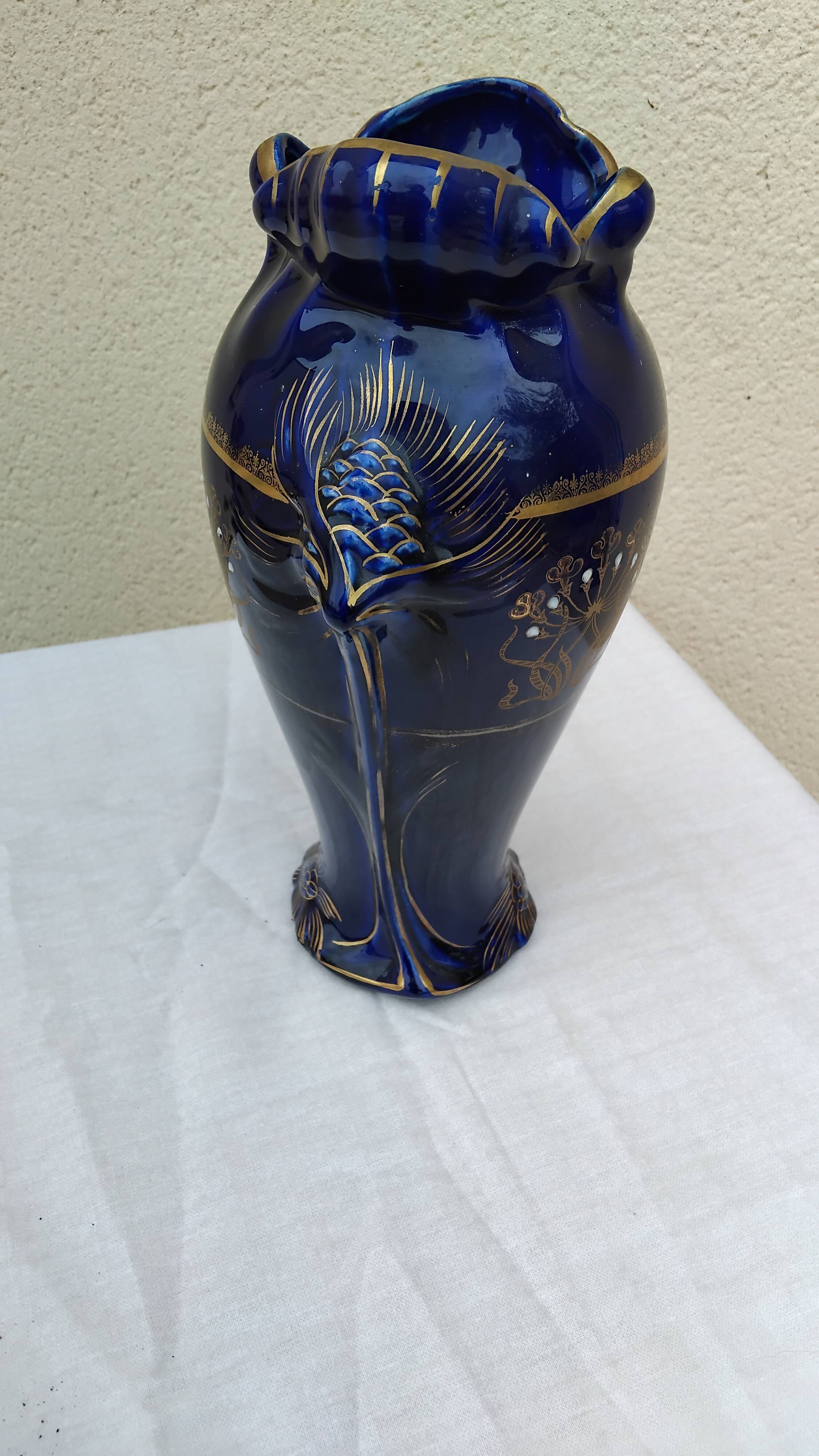 Large antique blue earthenware vase