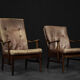 Modern vintage Danish armchair in beech and brown leather by Farstrup Møbler, 1970.
