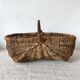 Woven wicker basket with hazelnut handle