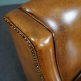 Modern charming armchair in sheepskin