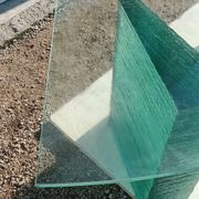 Bureau demi-lune en verre massif