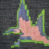 Bohemian floral design, handwoven wool rug, black background with colorful flowers