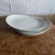 3 white porcelain plates for pasta like Saturnia restaurant