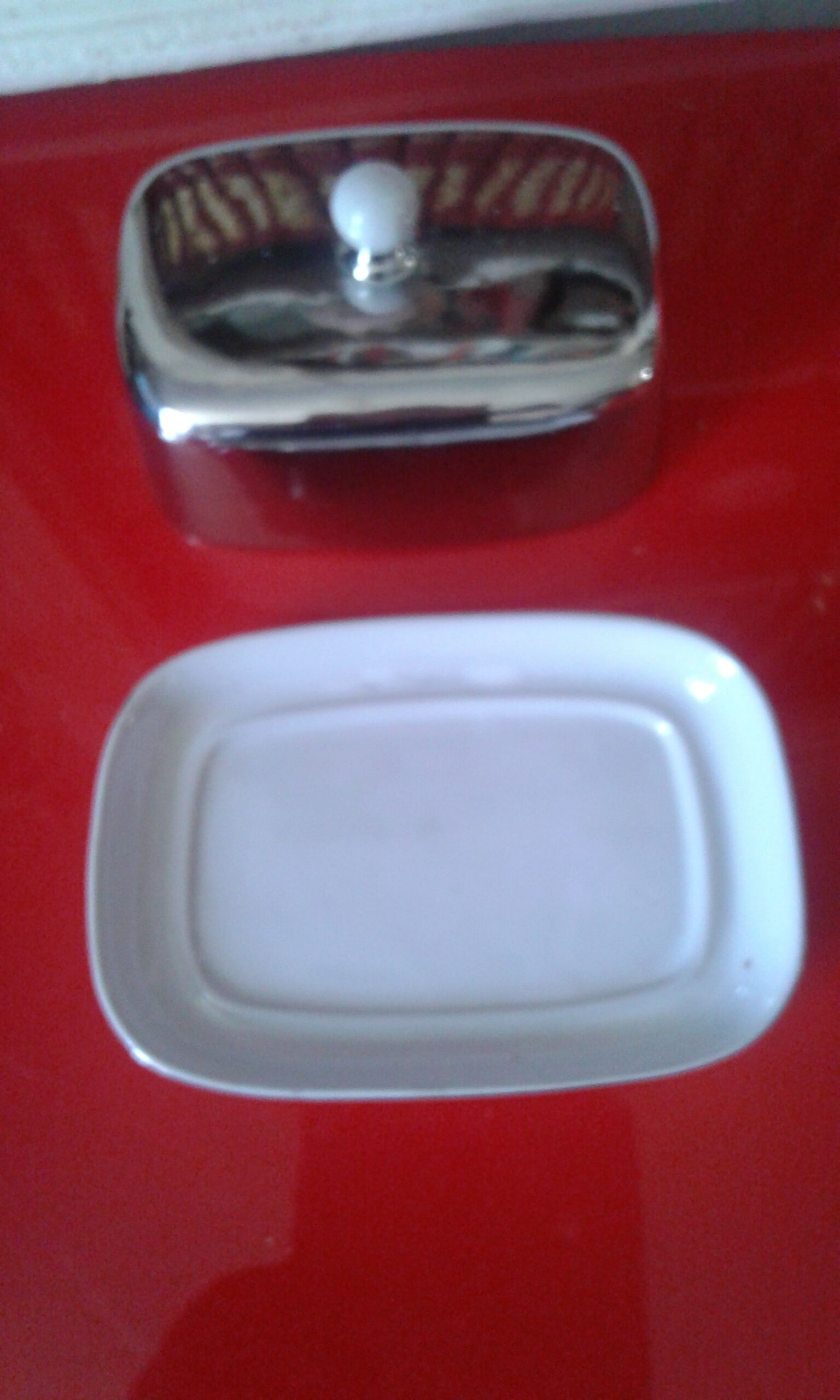 White and silver ceramic butter dish