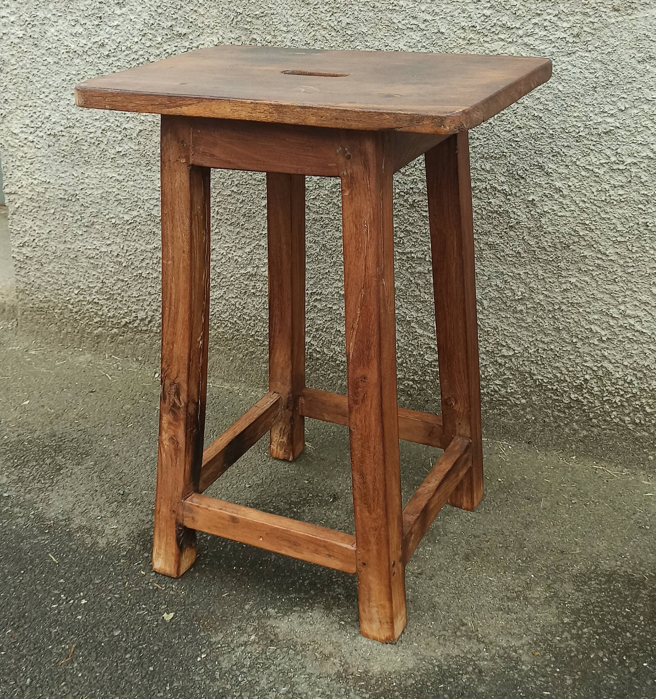 Old wooden high stool