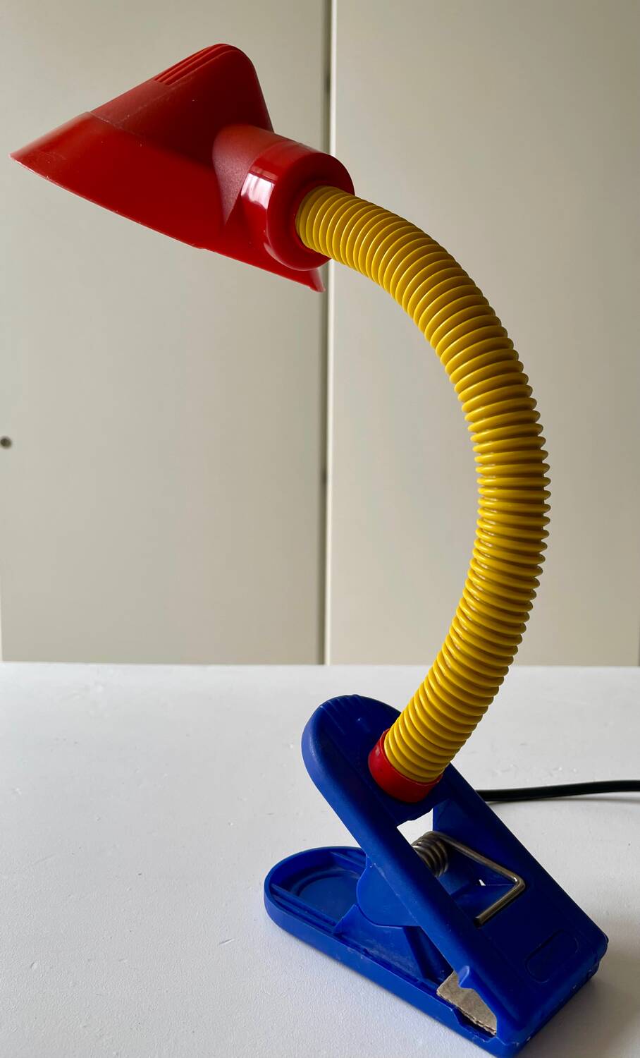 Articulated Memphis style clamp lamp