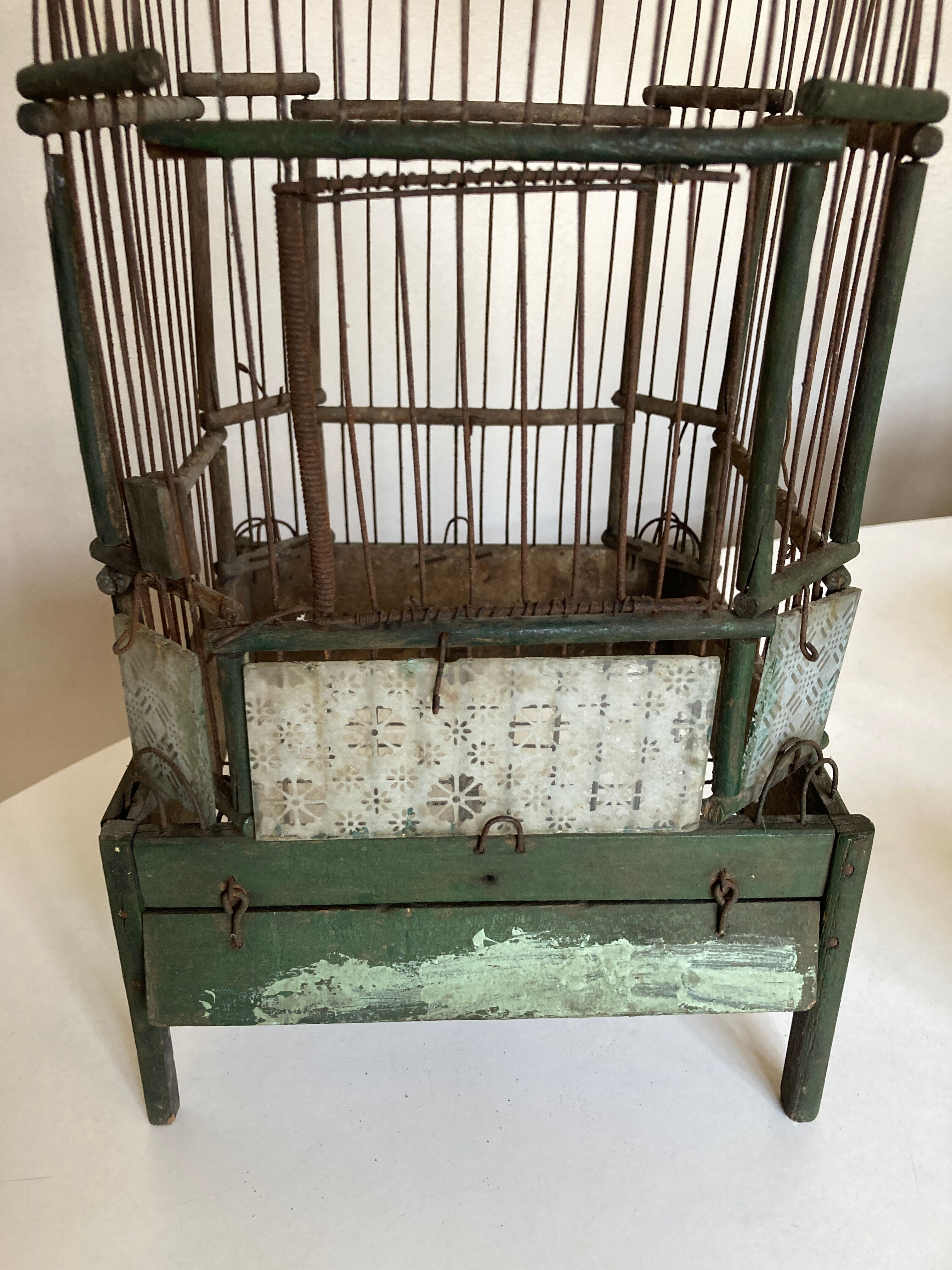 Octagonal bird cage made of wood and wire around 1920