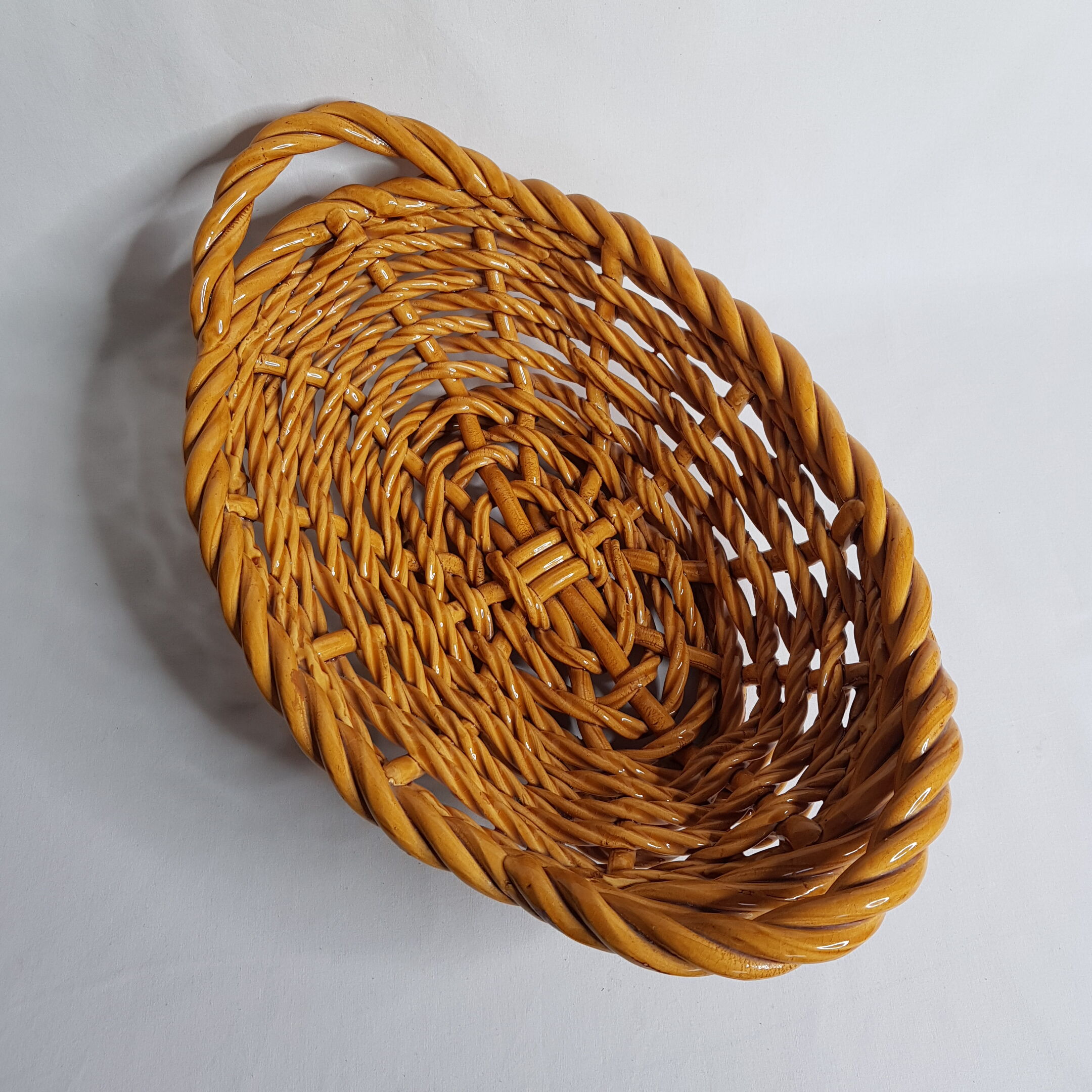 Fruit basket in golden yellow braided dab