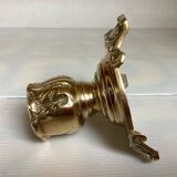 Tripod candlestick in worked bronze