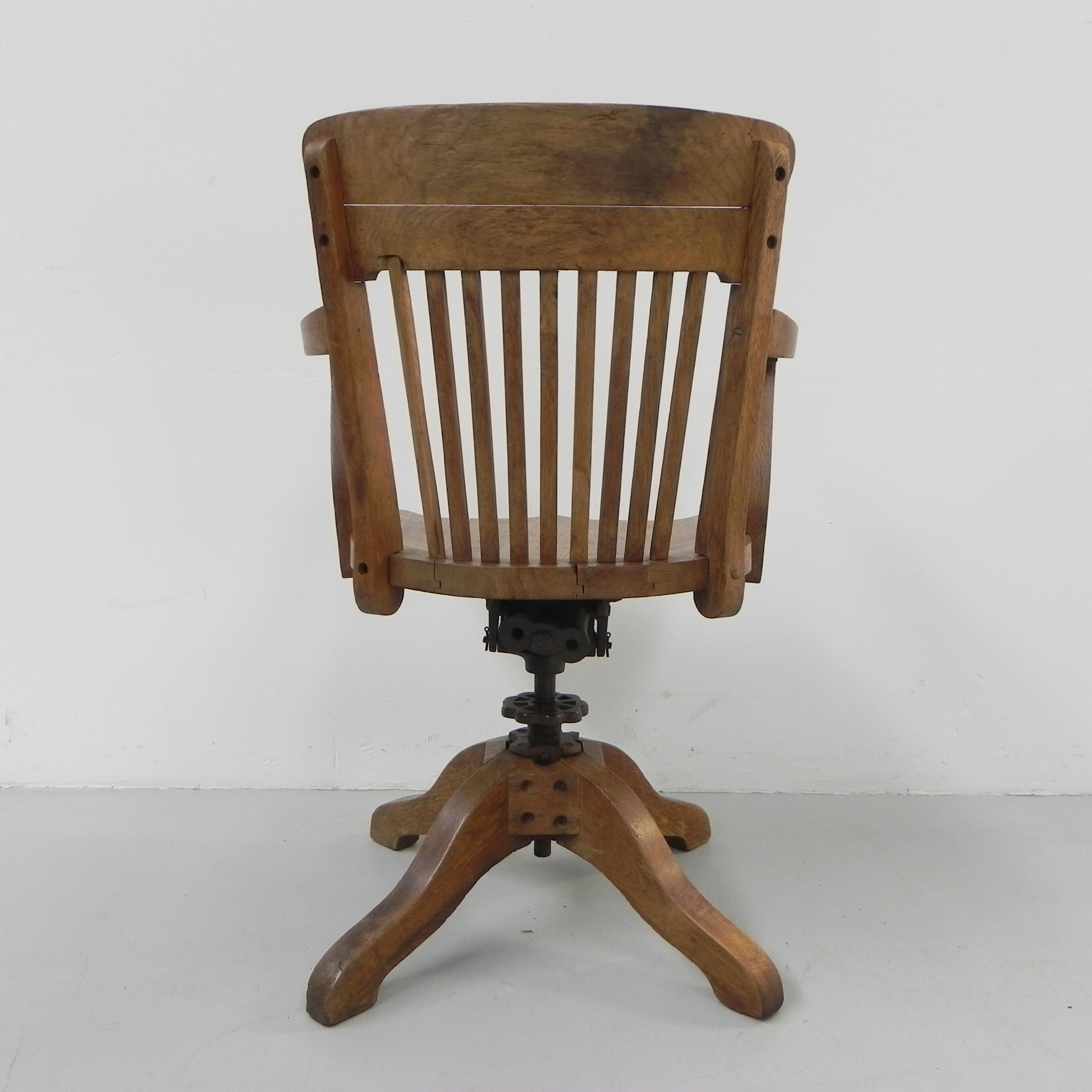 Oak office chair with spring mechanism and armrests