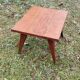 Coffee table of the 50s in blond mahogany inlaid compass feet