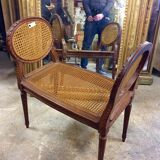 Banquette en cannage de style Louis XVI