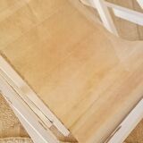 Old white wood deck chair Triconfort