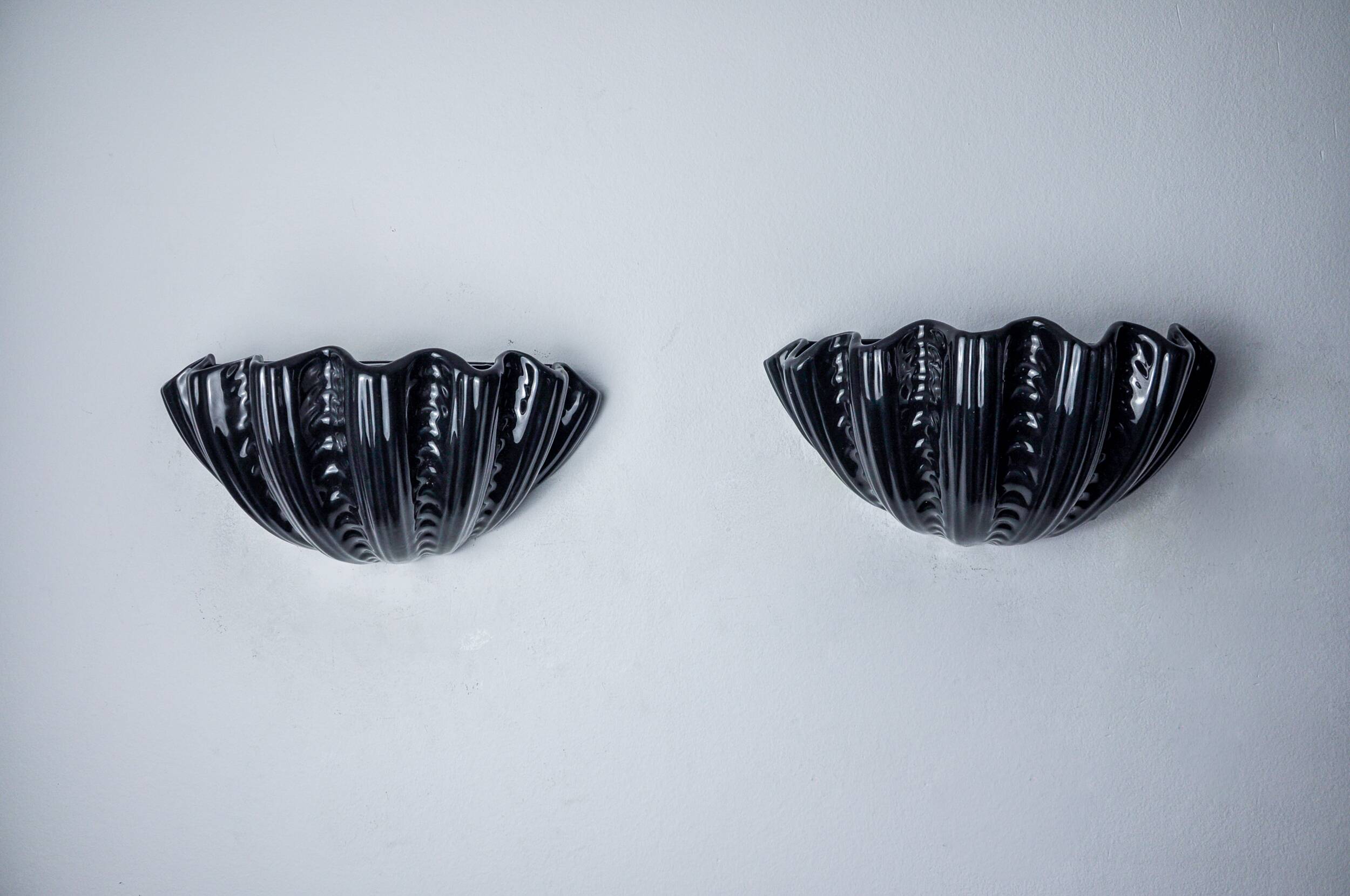 Pair of shell wall lights, black ceramic, Italy, 1970