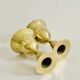 Pair of brass "bell" candle holders