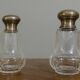 Pair of antique Louis XVI style bottles in finely engraved crystal and silver.