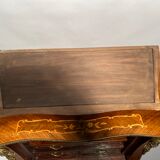 Curved secretary and inlaid with floral branches in Louis XV style