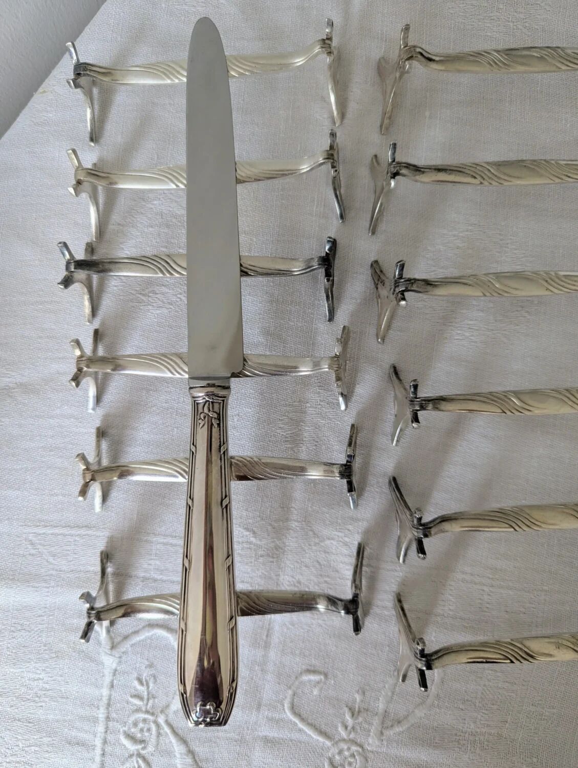 Set of 12 Christofle knife rests, Moderne 1912 model