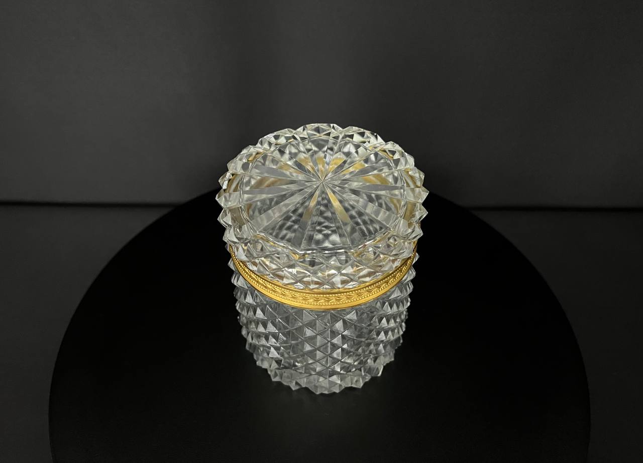 Cut crystal box with gilded bronze mount.