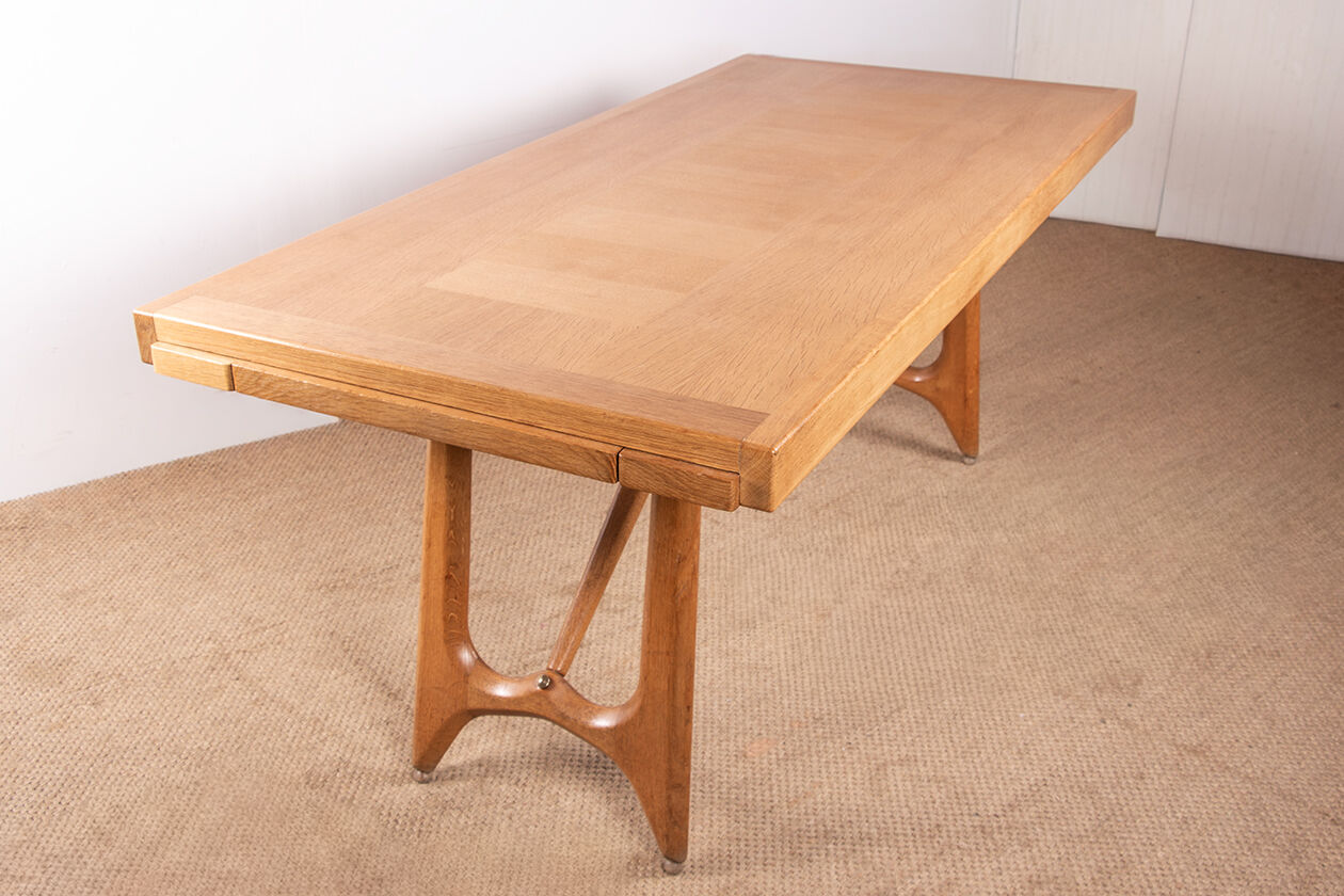 Large extendable dining table in oak by Guillerme and Chambron 1960.