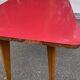 Scandinavian side table in solid wood and rosewood.