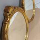 Paire de miroirs oval  doré vintage