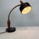Table lamp of black metal and teak of Danish design, 1960s
