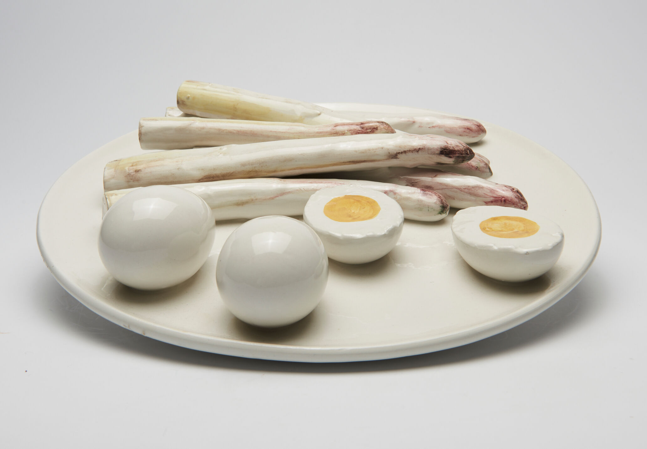 Wall plate with asparagus and hard-boiled eggs in relief, origin Italy