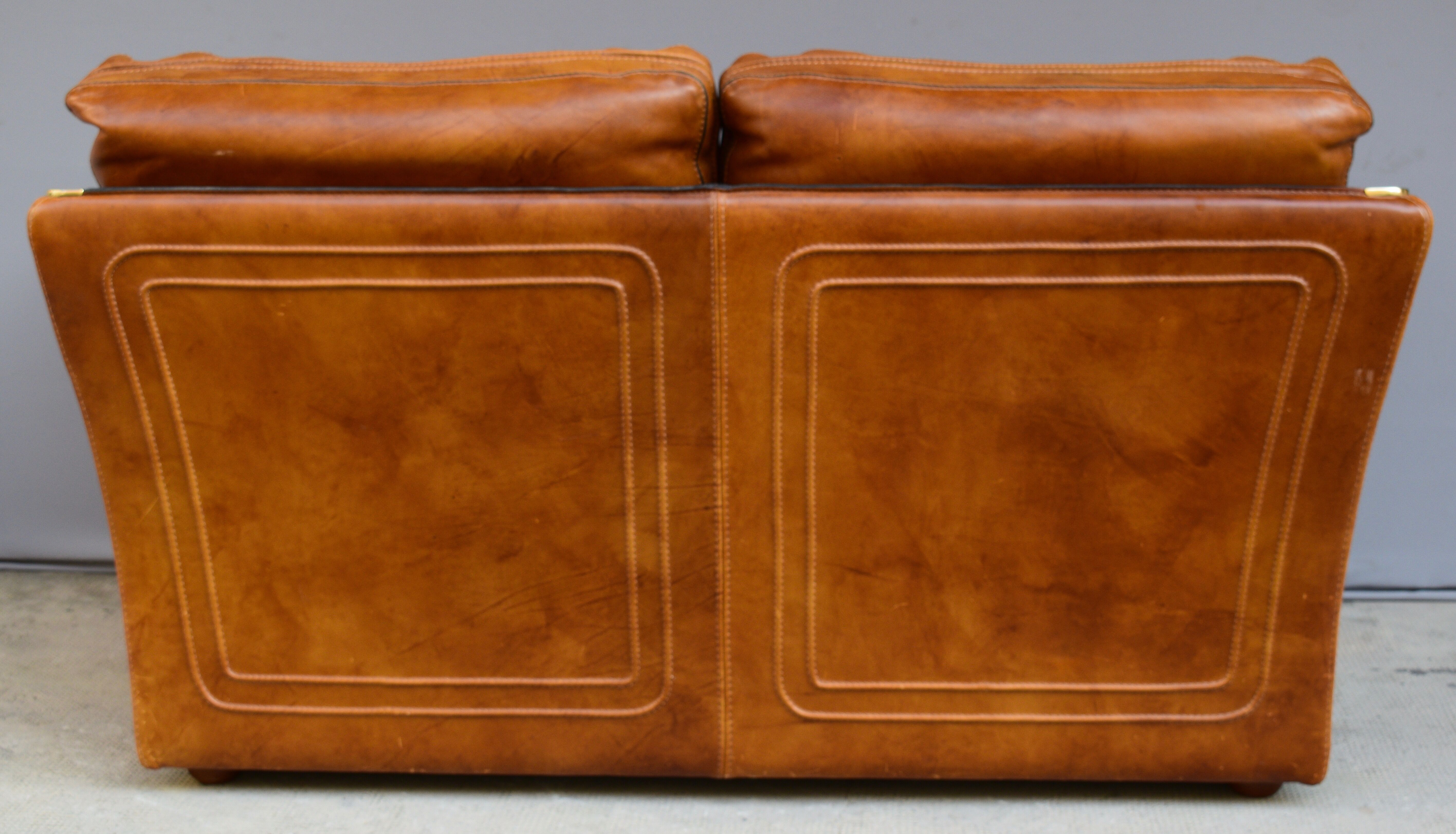 Vintage two-seater leather sofa