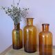 Amber glass vase bottle