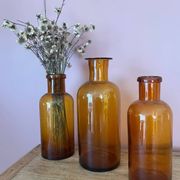 Amber glass vase bottle