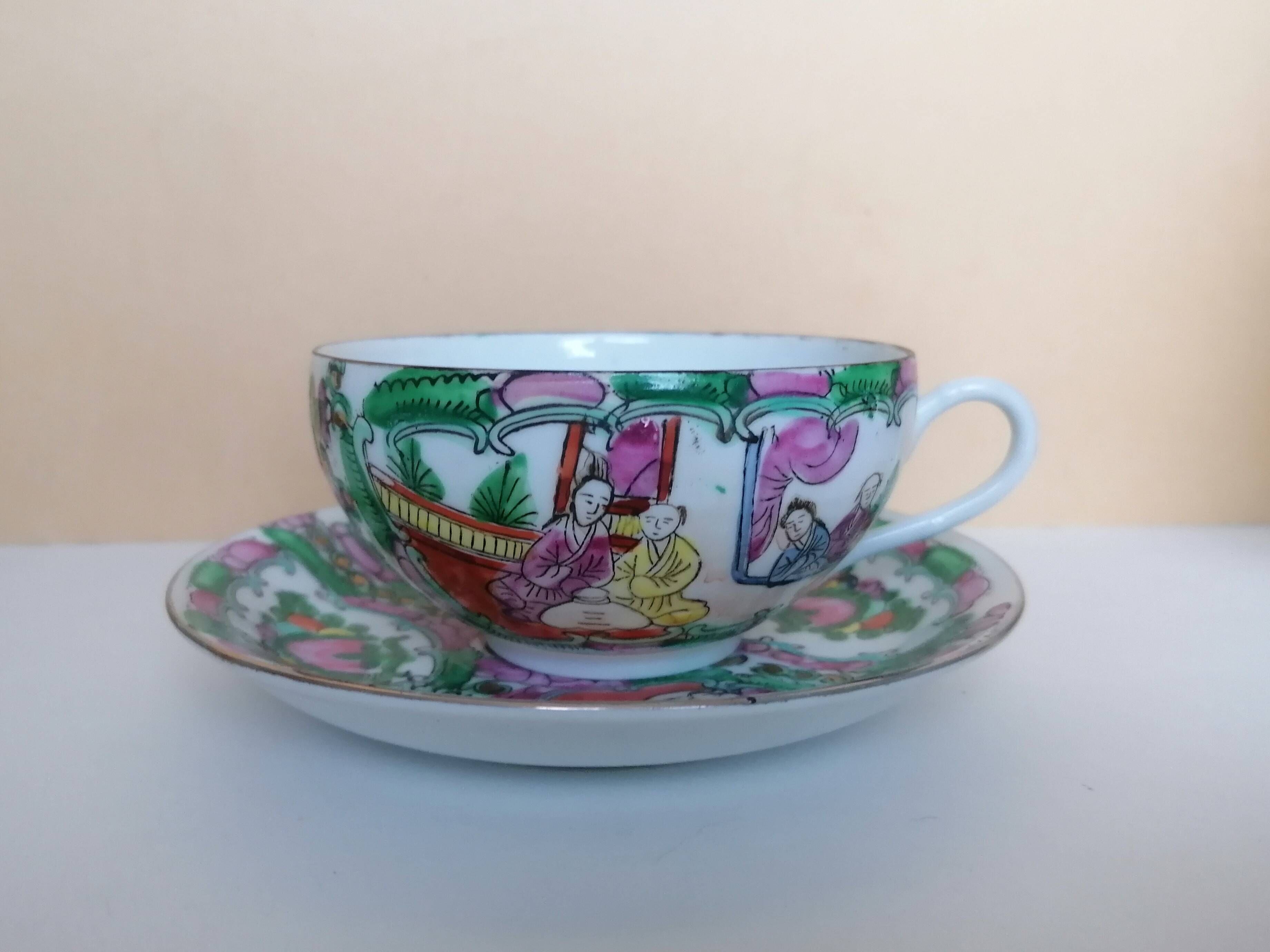 Canton porcelain tea service with 6 cups and teapot.