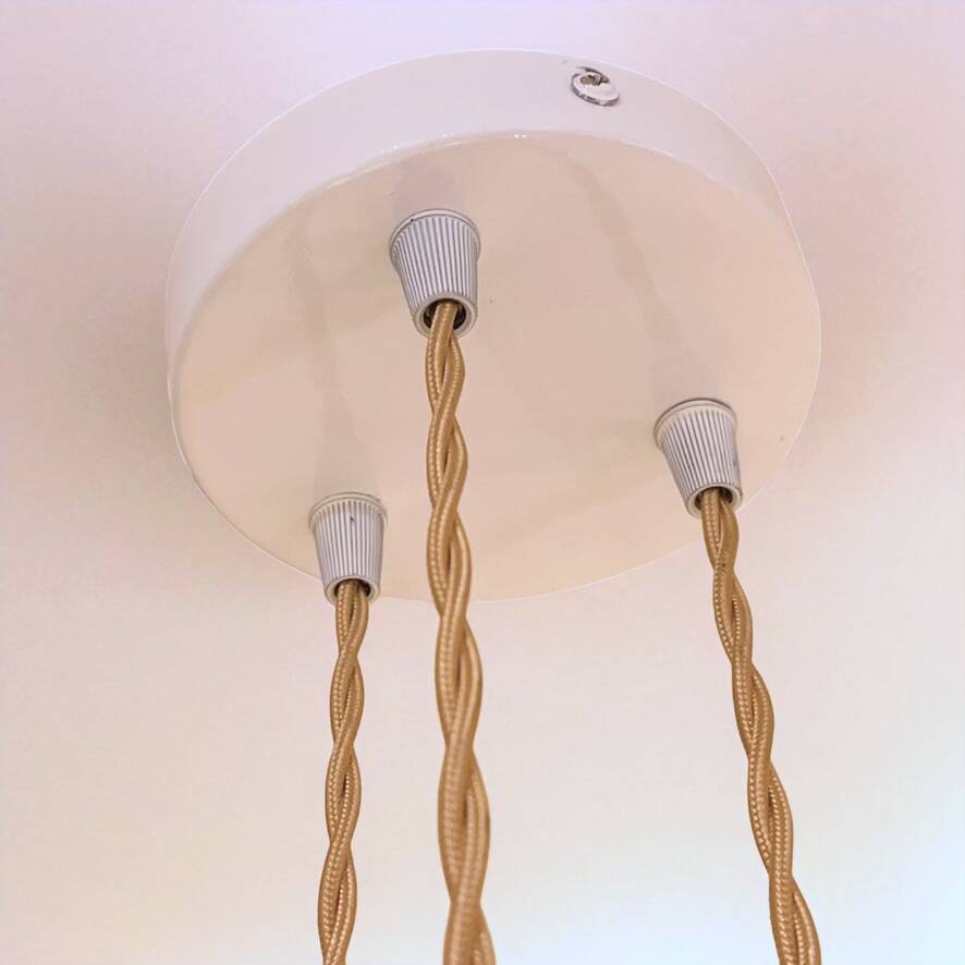 Cascade pendant light with 3 molded glass globes in vintage arabesque amber glass