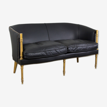 Black leather club sofa