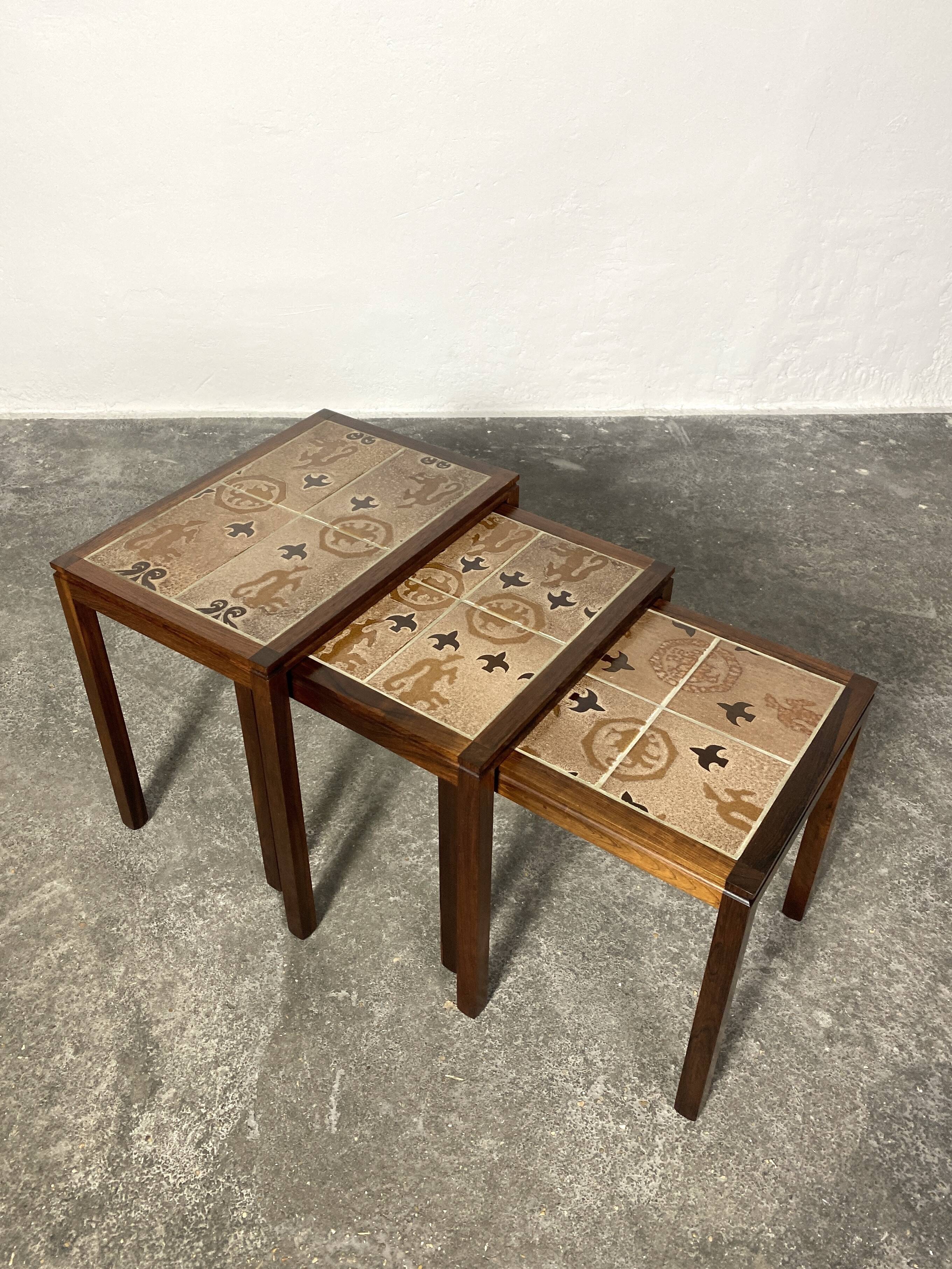 Danish nesting tables in rosewood and ceramic by Willy Ryomgard, Mo.