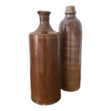 Pair of sandstone bottles