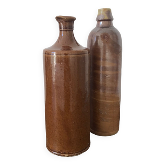 Pair of sandstone bottles