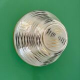 Vintage Art Deco globe wall/ceiling light in white, black, and gold glass.