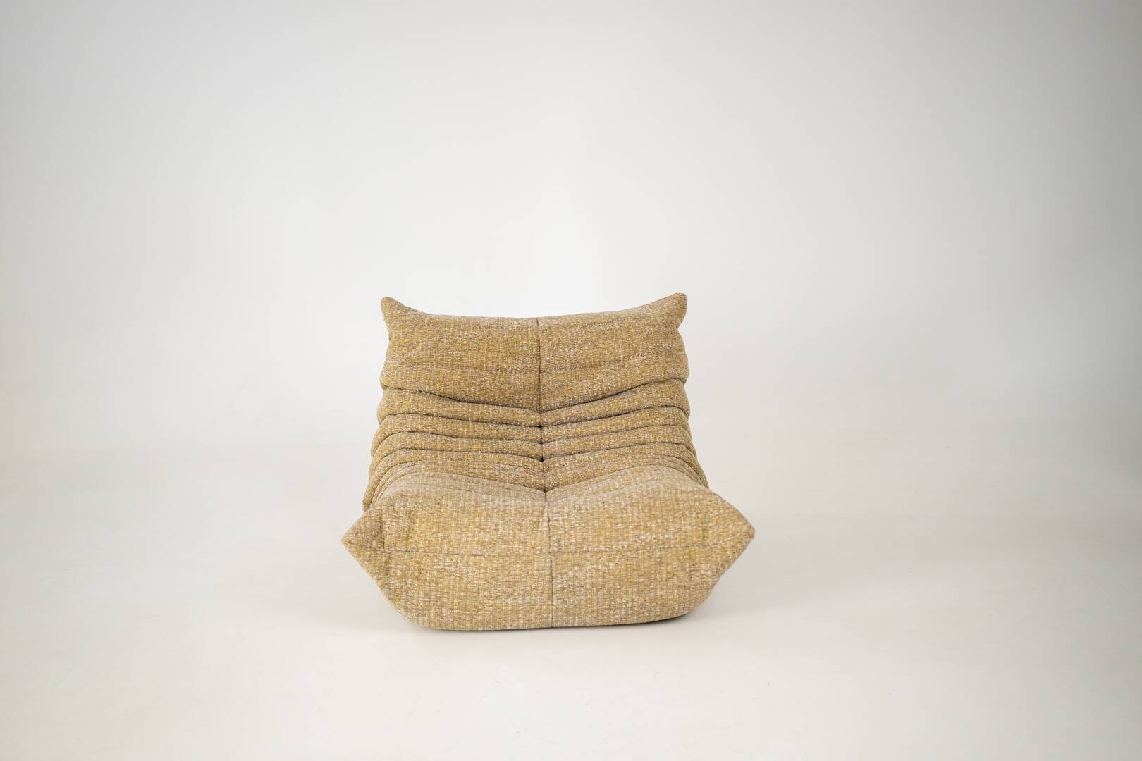 Togo set of launge chair and pouf in caramel loop