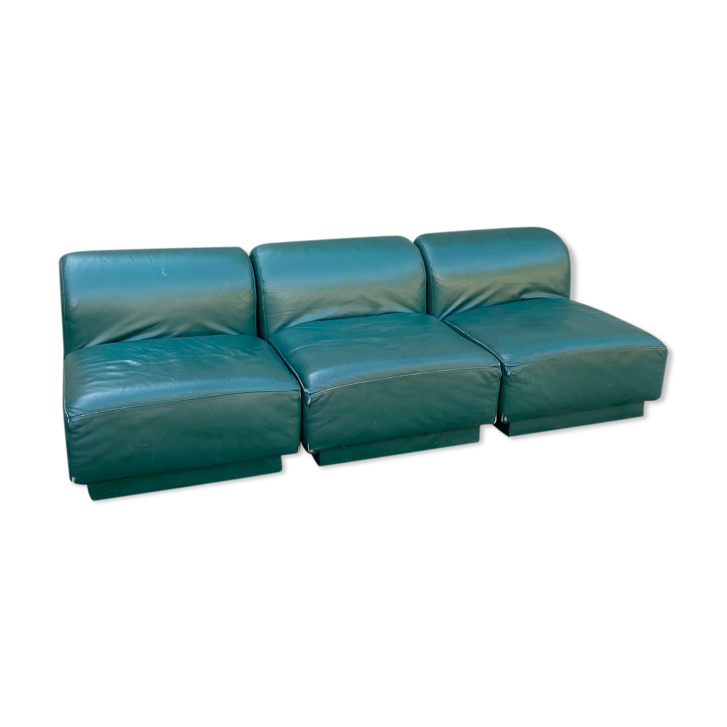 Green leather armchairs