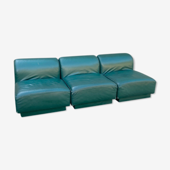 Green leather armchairs
