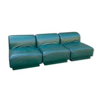 Green leather armchairs