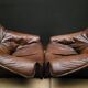Pair of Vintage Brutalist armchairs from the 60s in leather and solid oak