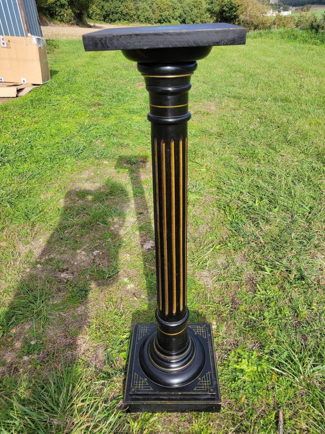 Napoleon III stand column in blackened wood and gold, mid-19th century