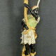 Early XXth era polychrome wooden torch has figuration of a Moor in traditional costume from the 18th