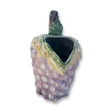 Old bunch pitcher of dabbling grapes