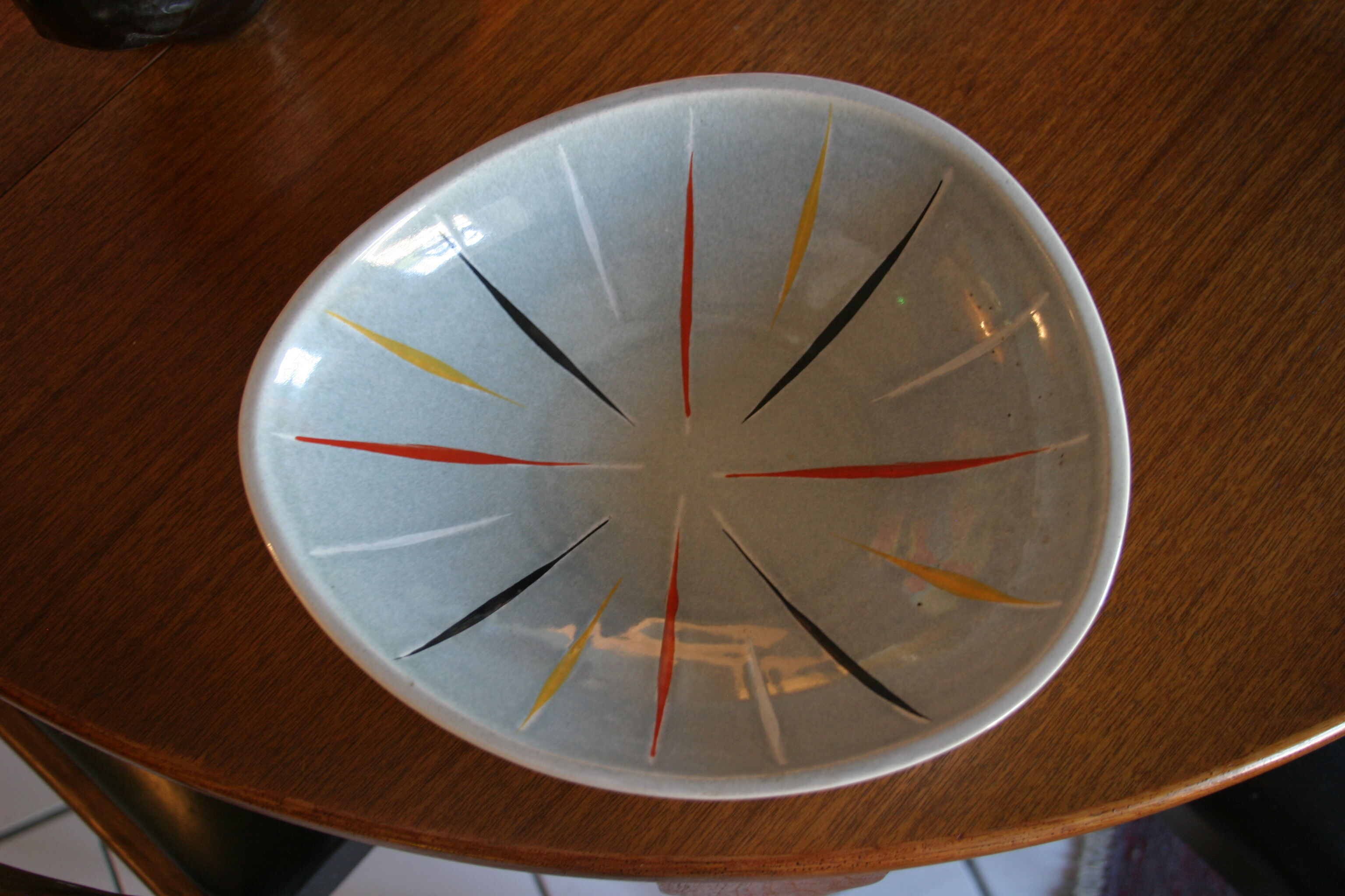 Ceramic cup with colorful stripes
