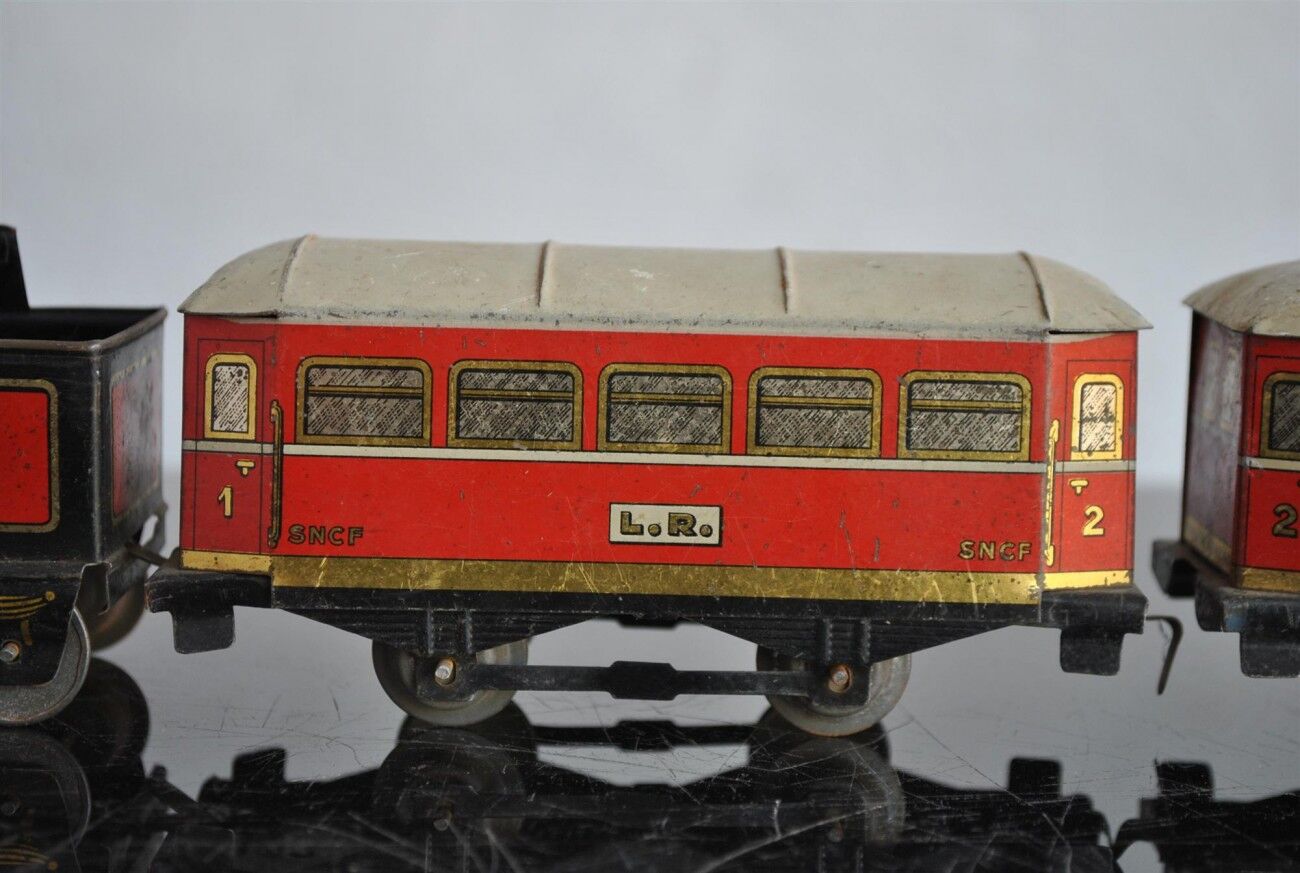 Tin litho brand LR spring-loaded toy locomotive