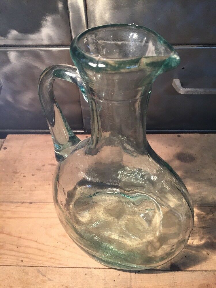 Bluish green glass decanter