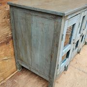 Antique glass-fronted buffet in Burmese teak